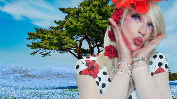 Pic of Beautiful Transgender Girl Modeling Red Roses